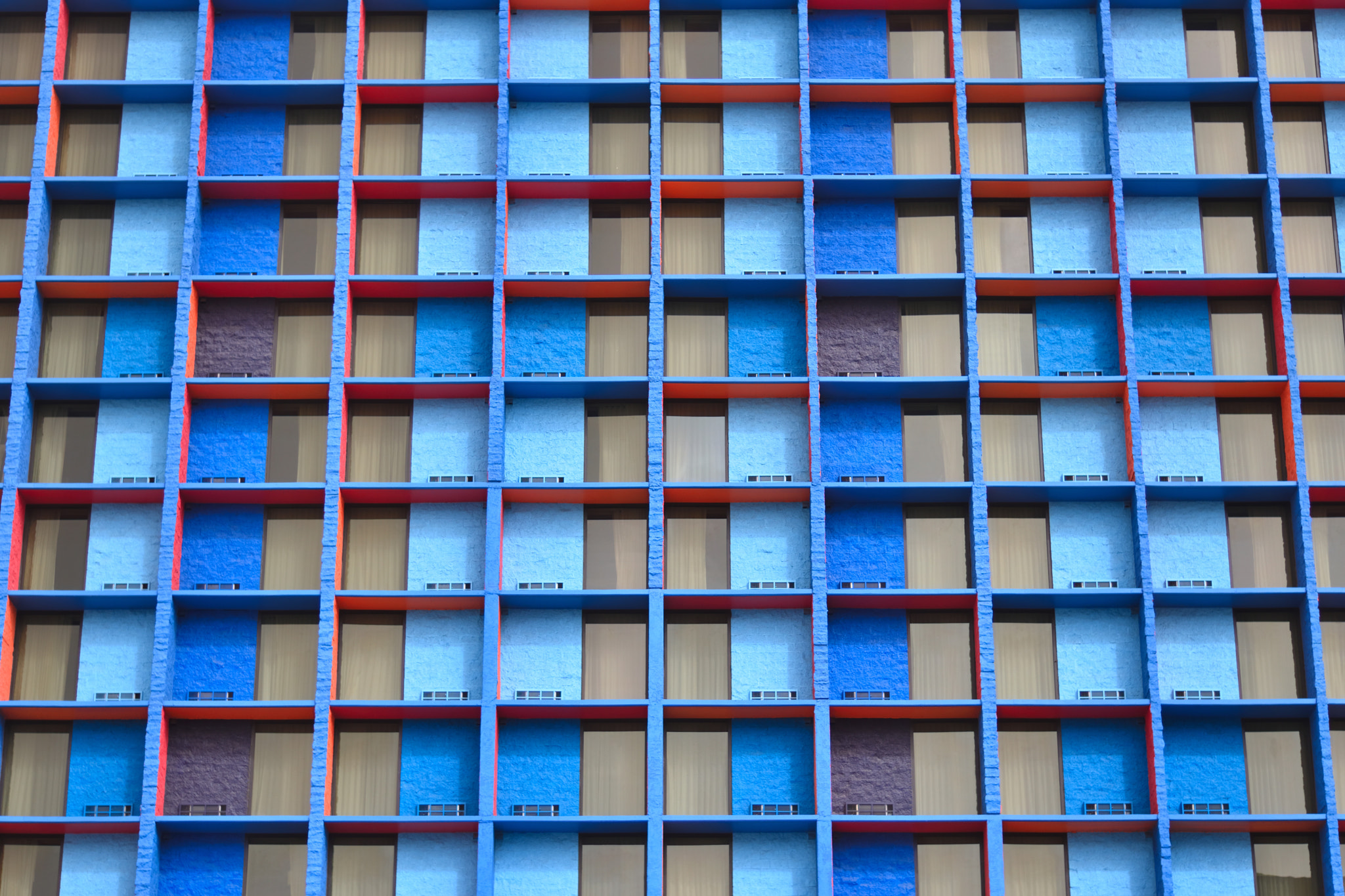 Nikon D5500 + Nikon AF-S Nikkor 50mm F1.8G sample photo. Blue building photography