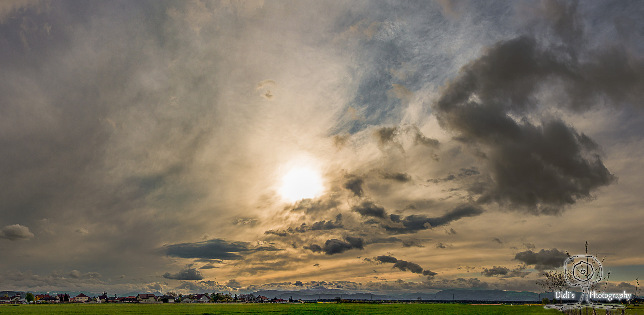 Olympus M.Zuiko Digital ED 12-50mm F3.5-6.3 EZ sample photo. Wonderful Ülay clouds with sun photography