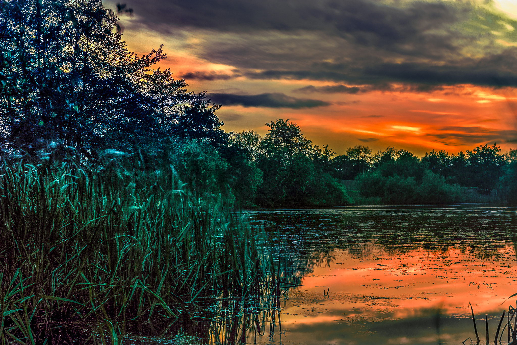 Canon EF 22-55mm f/4-5.6 USM sample photo. Sunset over pond photography