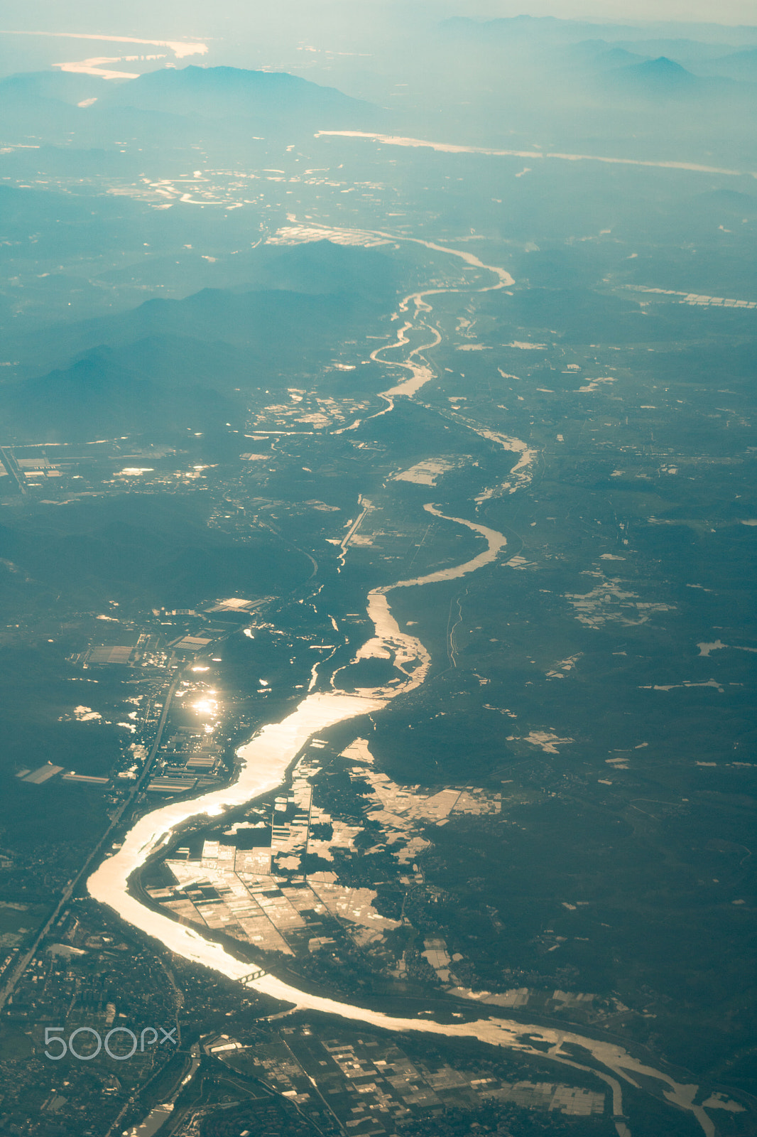 Sony a6300 + Sony FE 50mm F1.8 sample photo. River shining from ground photography