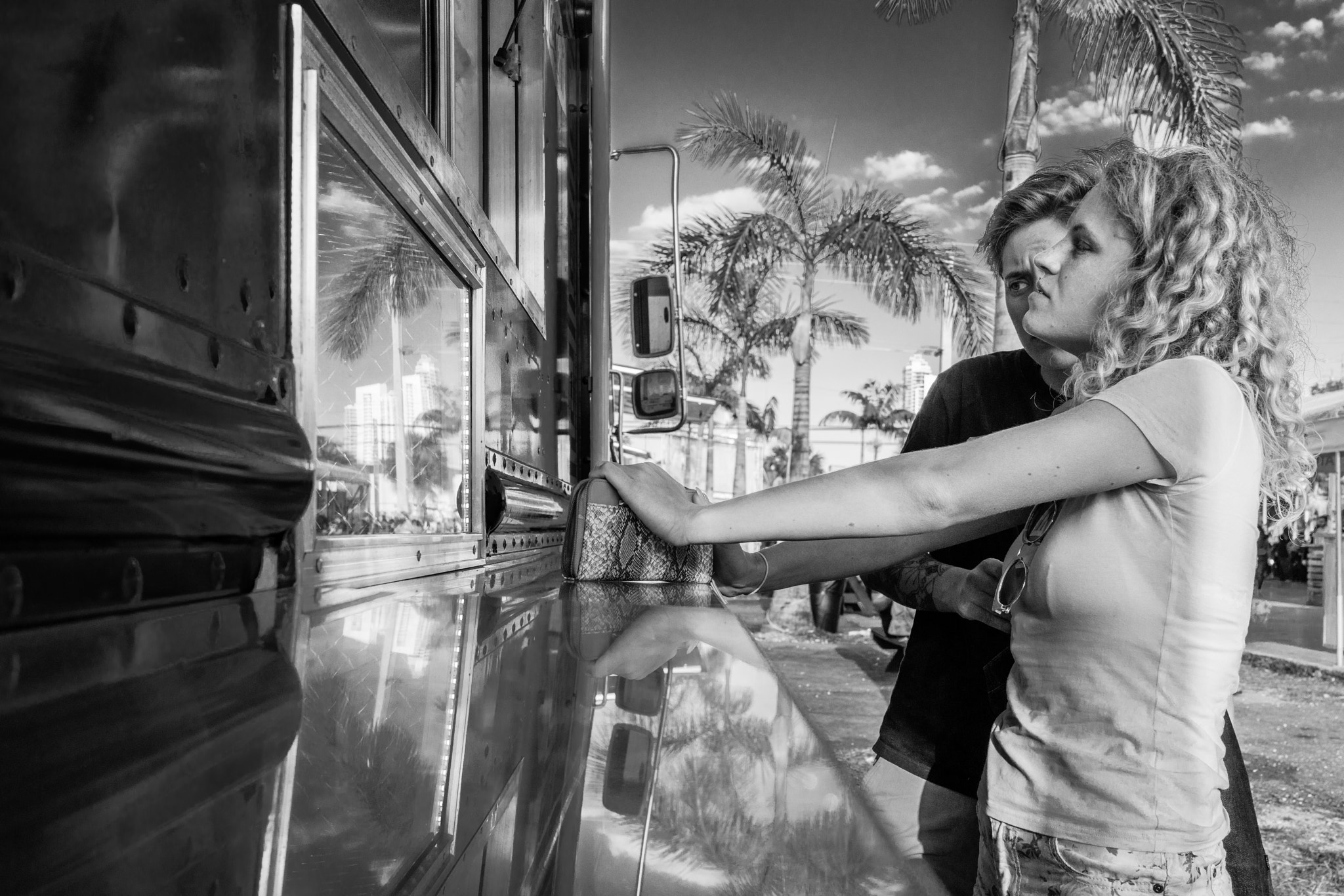 35mm F2.0 sample photo. People of miami - tropical reflections... photography
