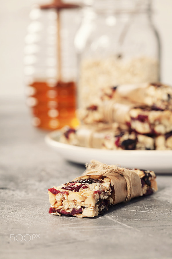 Canon EF 100mm F2.8 Macro USM sample photo. Granola bar on a grey rustic table photography