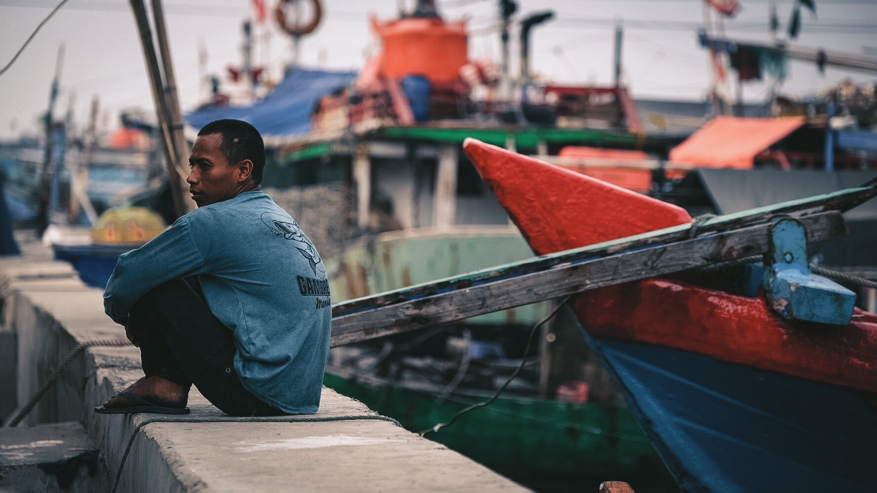 Fujifilm X-T10 + Fujifilm XF 50-140mm F2.8 R LM OIS WR sample photo. A fisherman and his fishing boat photography