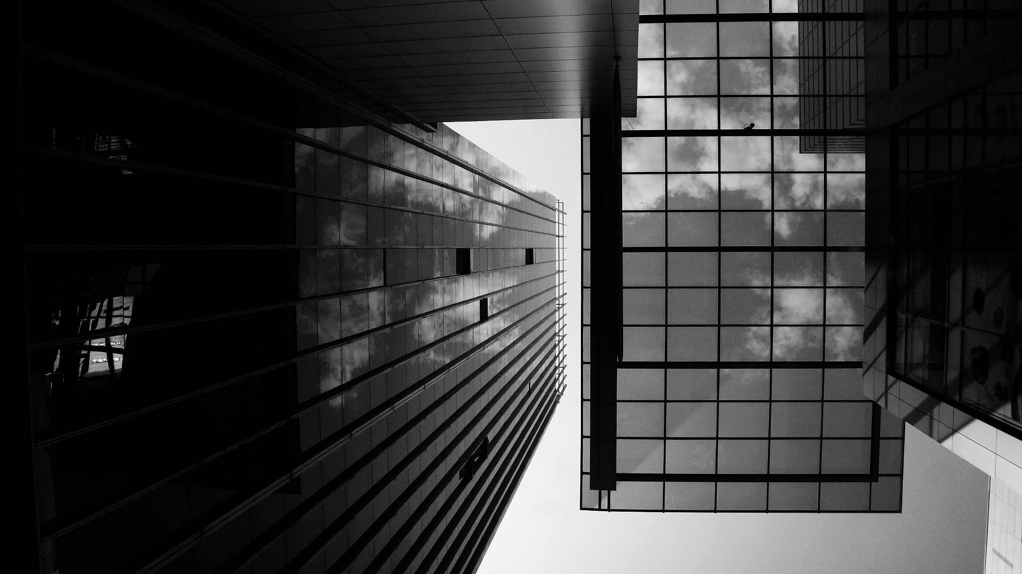 Sony DT 18-250mm F3.5-6.3 sample photo. Modern structure against the sky photography