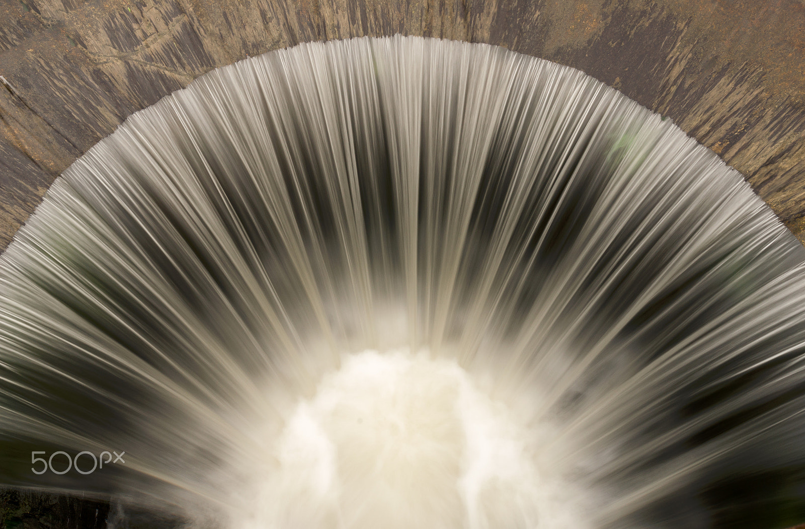 Sigma 17-50mm F2.8 EX DC OS HSM sample photo. Semi circle weir on the river with nice foam photography