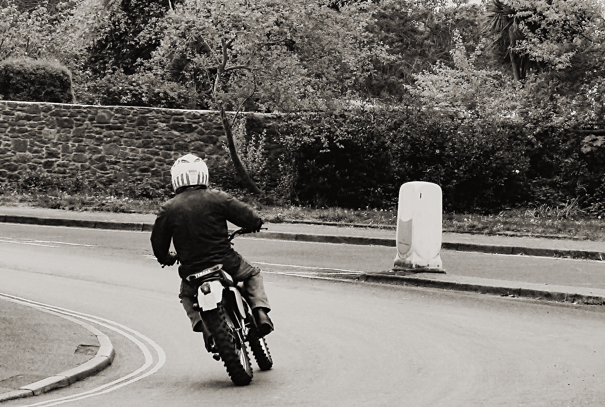 Panasonic Lumix DMC-G3 + Panasonic Lumix G Vario 45-200mm F4-5.6 OIS sample photo. The modern day lone rider: paignton, devon, uk. photography