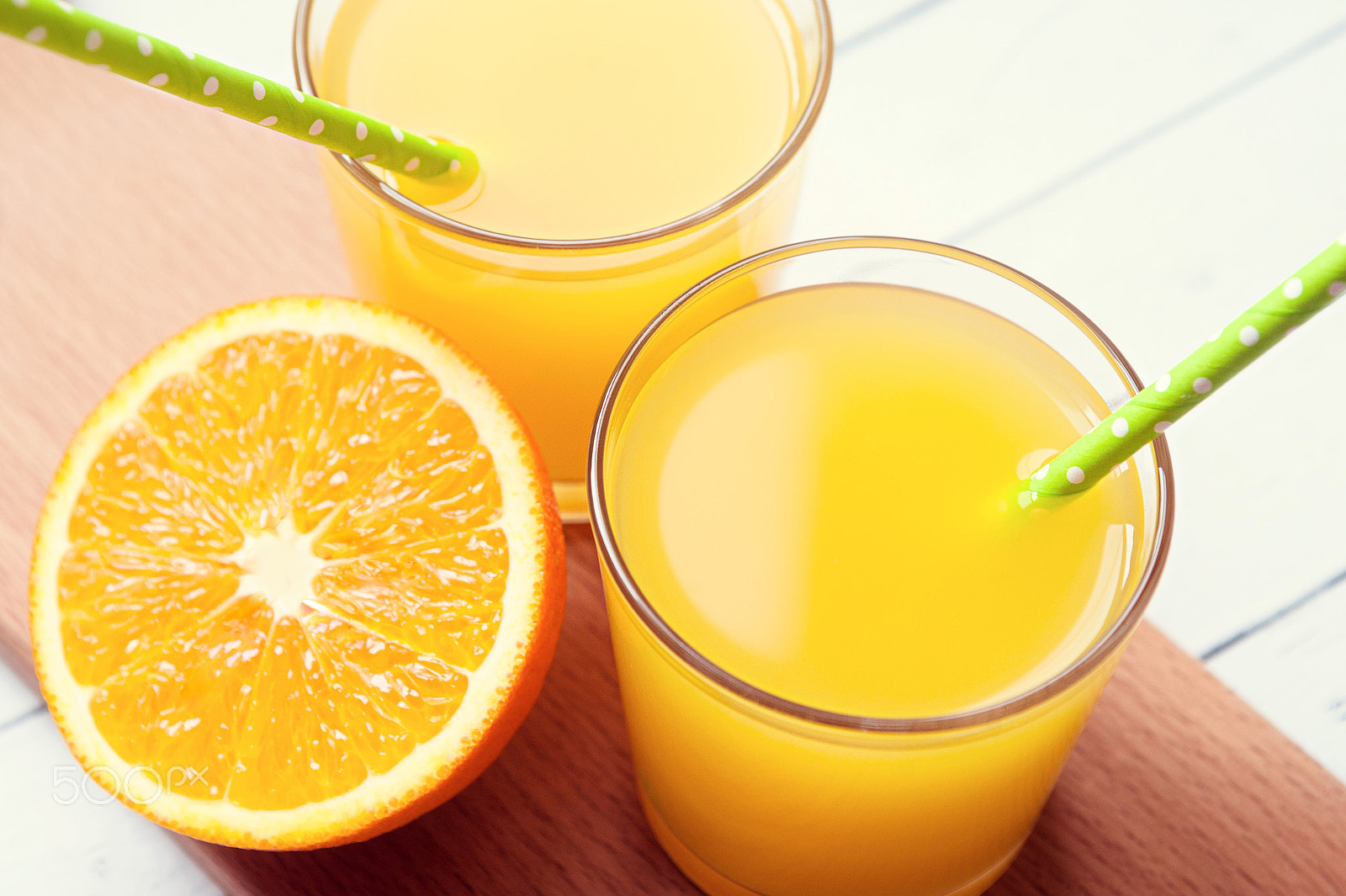 Nikon D700 + Sigma 24-70mm F2.8 EX DG Macro sample photo. Orange juice with sliced orange on the wooden background photography