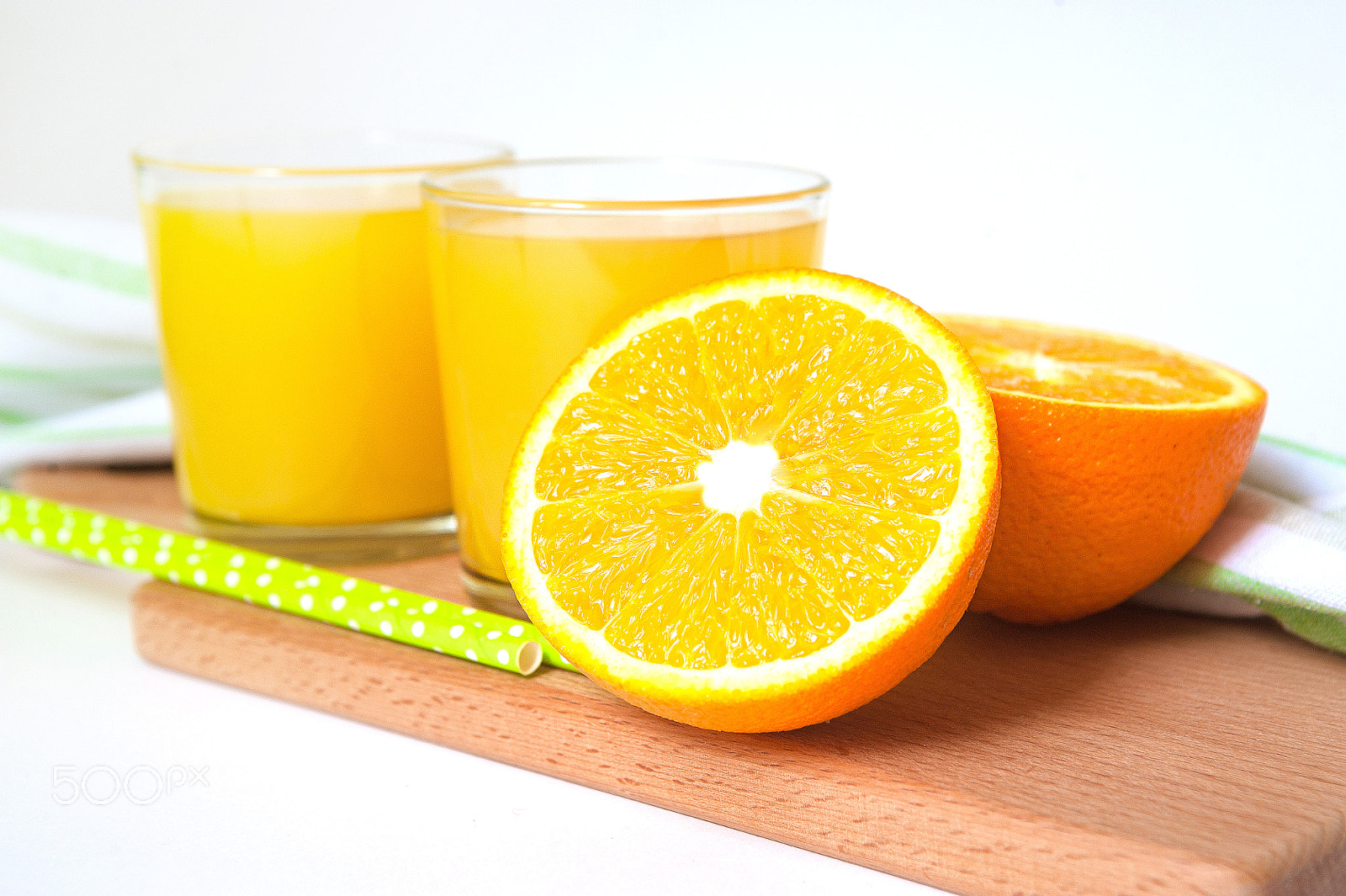 Nikon D700 + Sigma 24-70mm F2.8 EX DG Macro sample photo. Orange juice on wooden table with sliced fruits photography