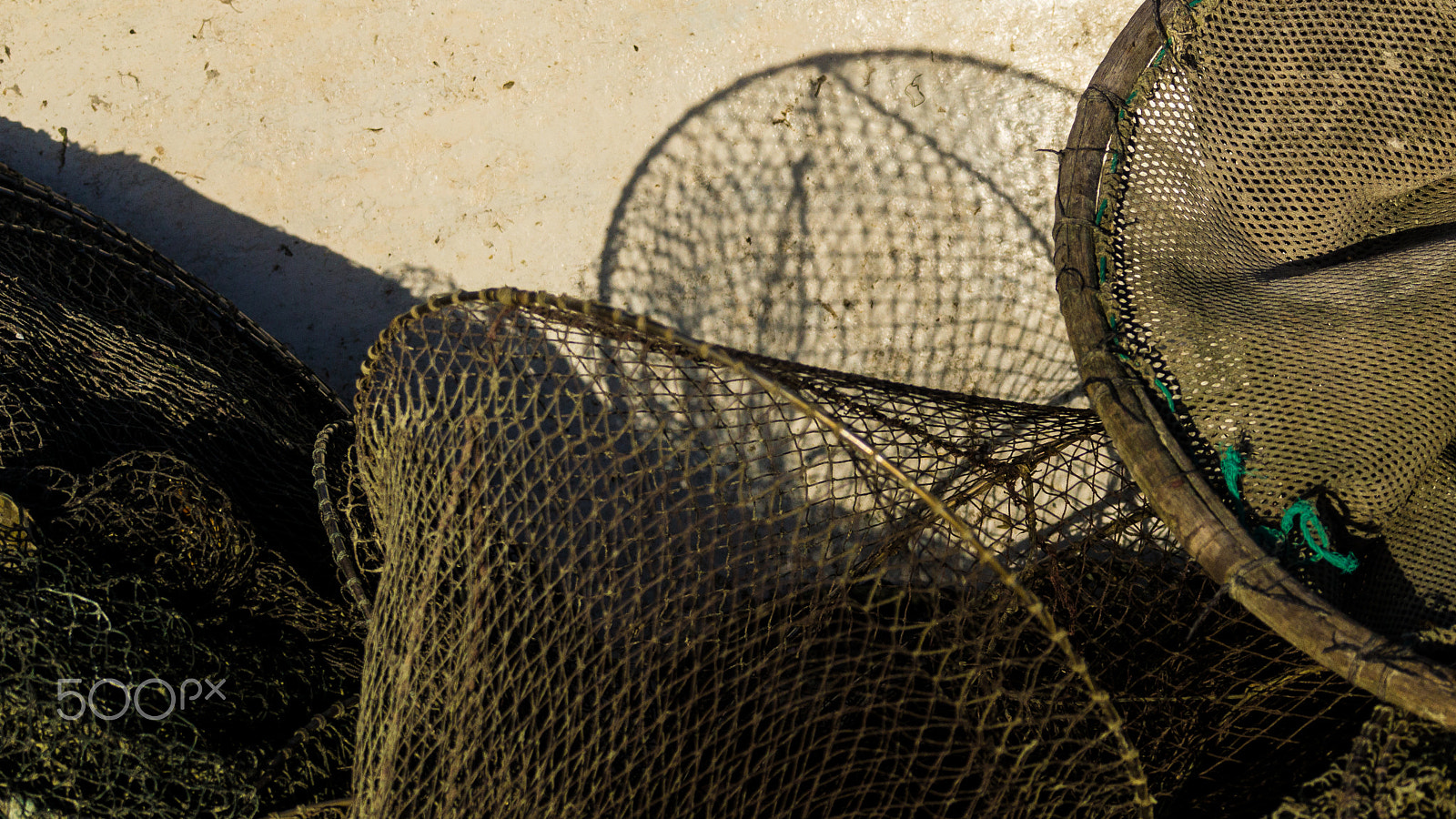 Sony SLT-A77 sample photo. Shadow of fishing nets photography