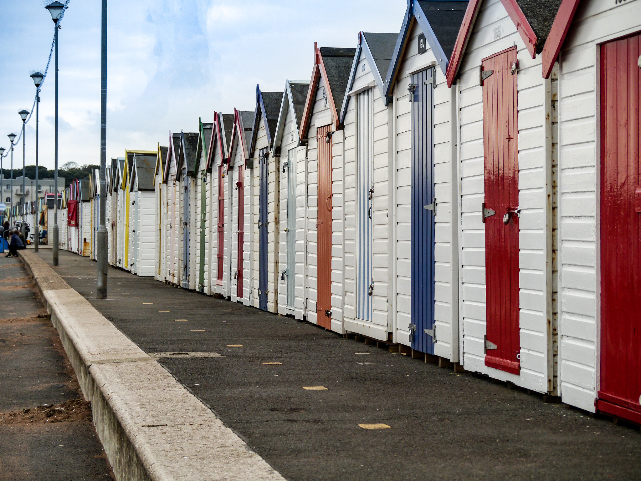 Panasonic Lumix DMC-G3 + Panasonic Lumix G Vario 45-200mm F4-5.6 OIS sample photo. Beach huts photography