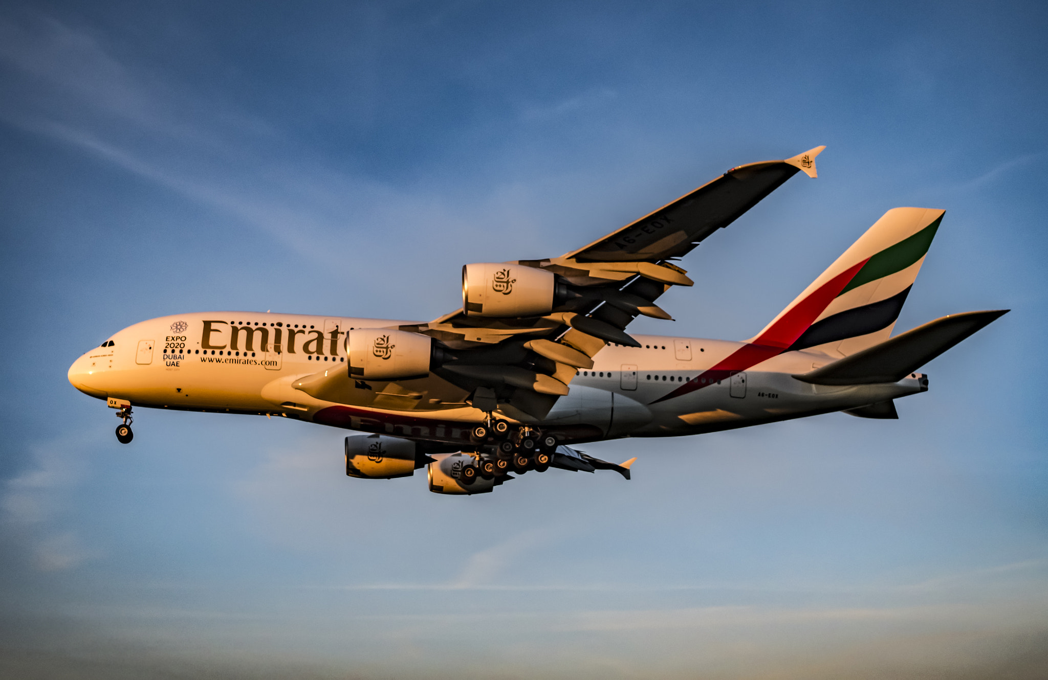 Olympus PEN-F sample photo. Emirates airbus a380 on final approach photography