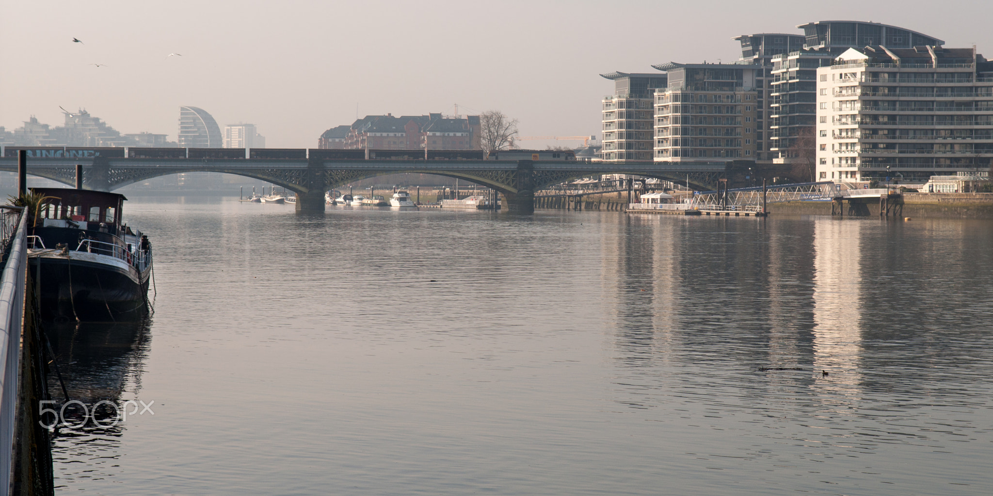 Freight train crossing the River Thames