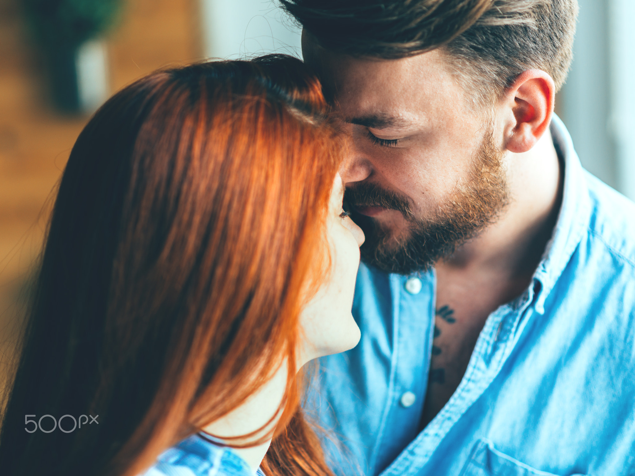 Girlfriend kissing her boyfriend.