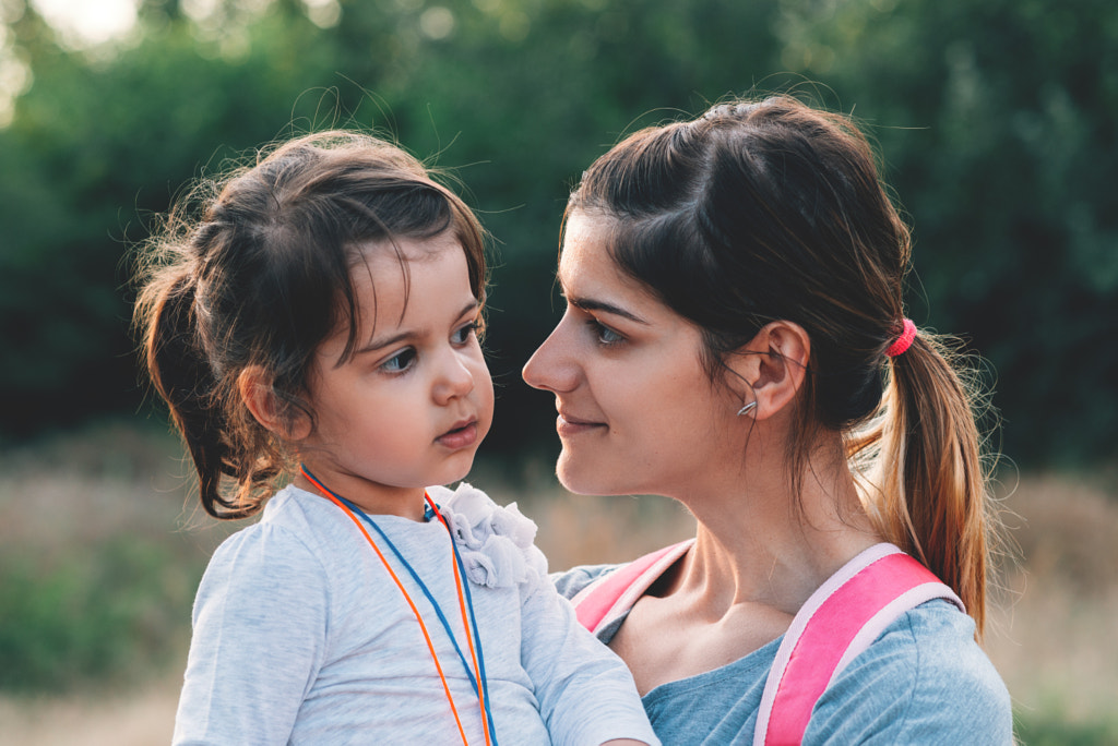 Beautiful  woman holding and hugging her daughter. by Igor  Milic on 500px.com