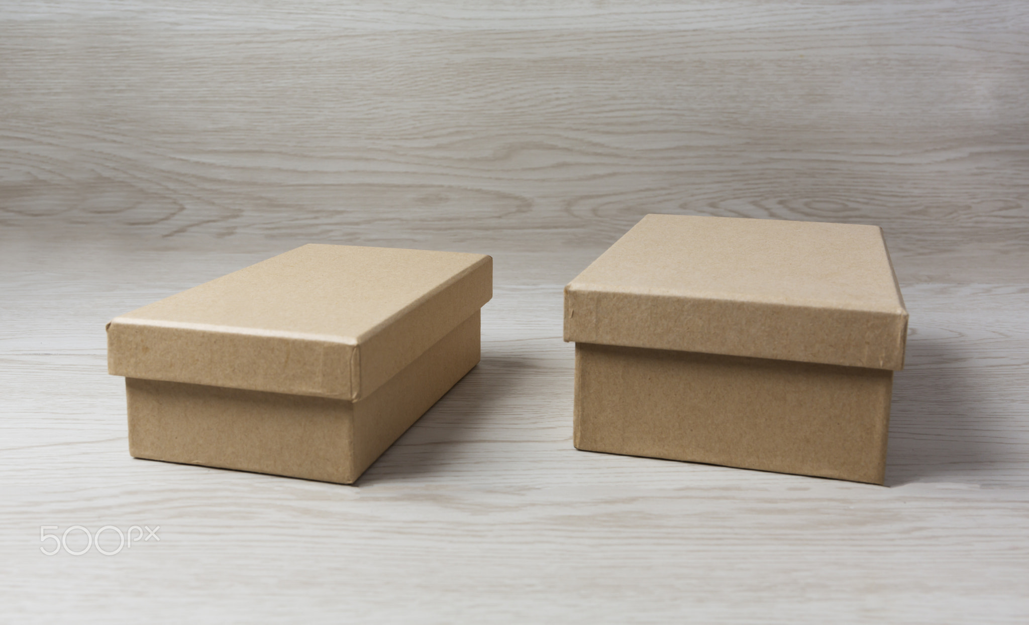 Two Paper box on white wooden background