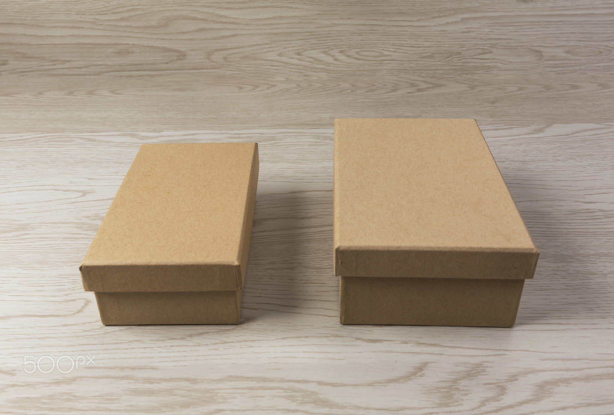 Two Paper box on white wooden background