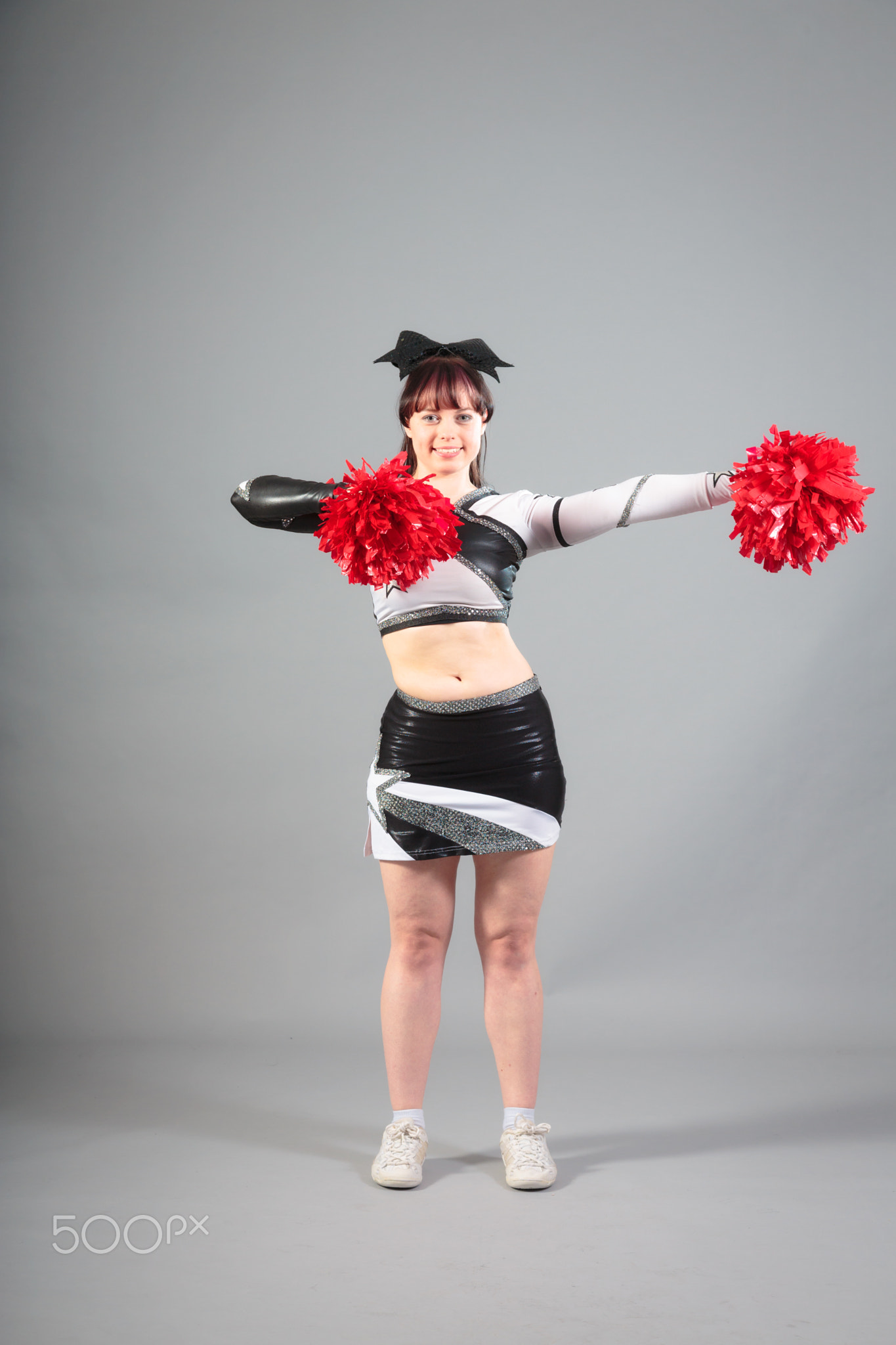 Studio Shot of Cheerleader Posing