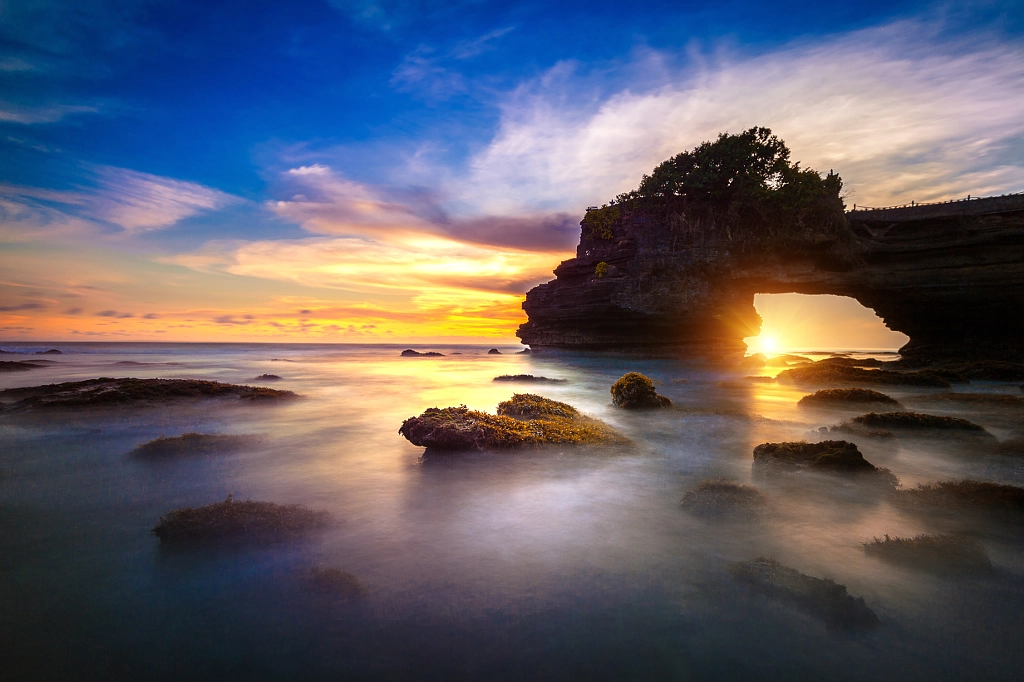 Tanah Lot Temple at sunset in Bali, Indonesia.(Dark) by tawatchai prakobkit on 500px.com