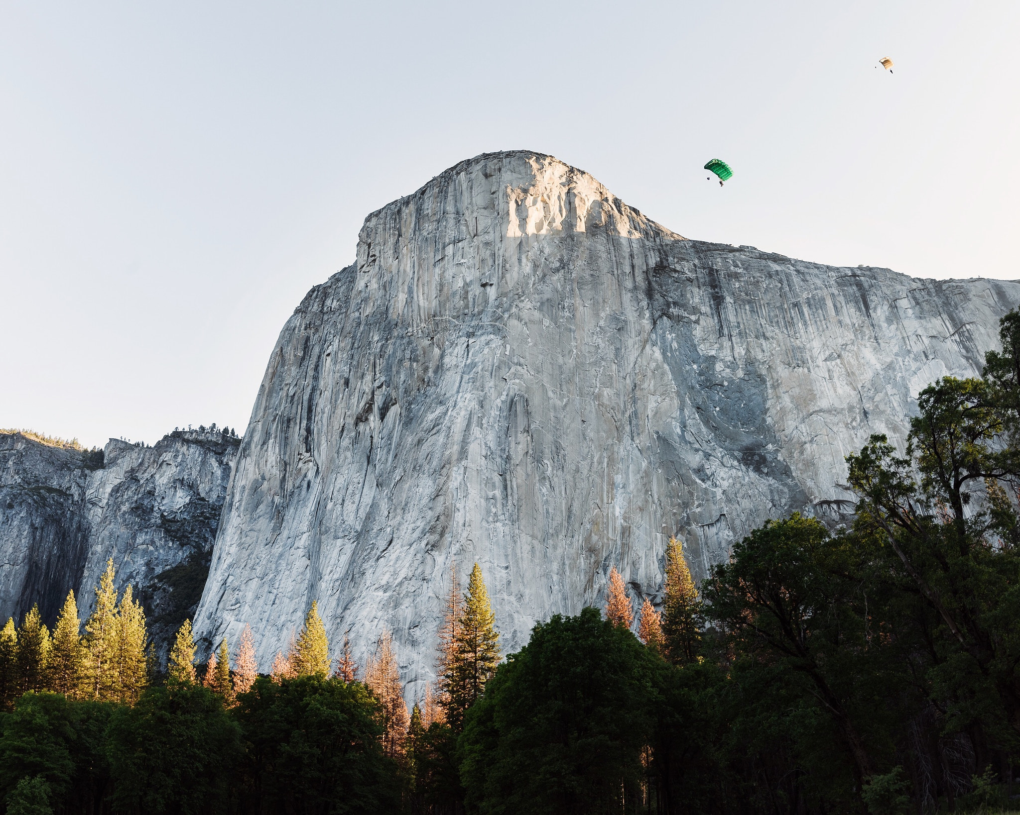sunrise base jumping el capitan. yosemite. califor by Tanner Wendell Stewart / 500px