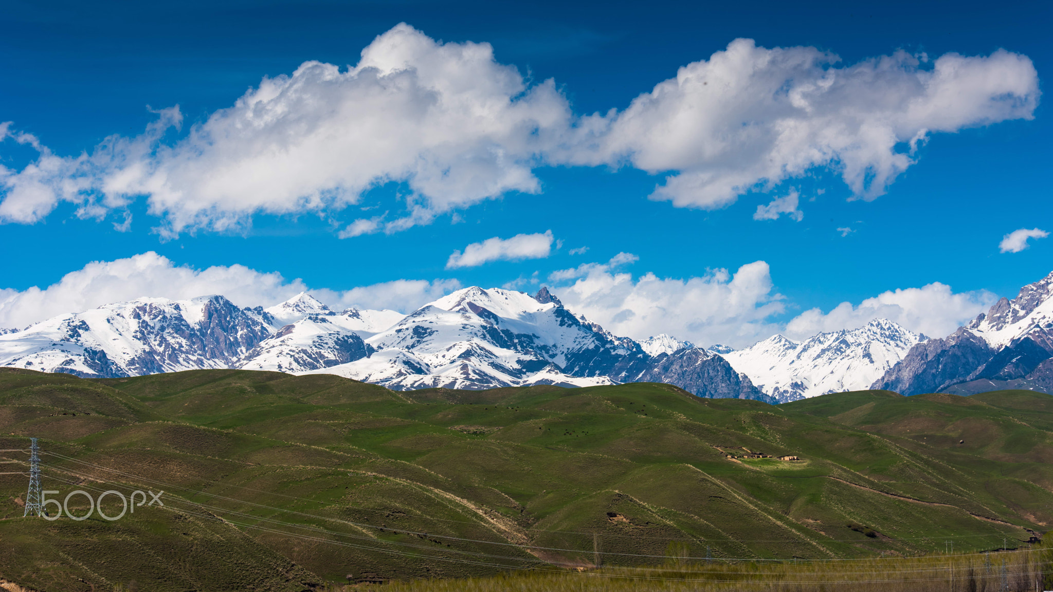 Clouds and glaciers over pasture of Ily Xinjiang