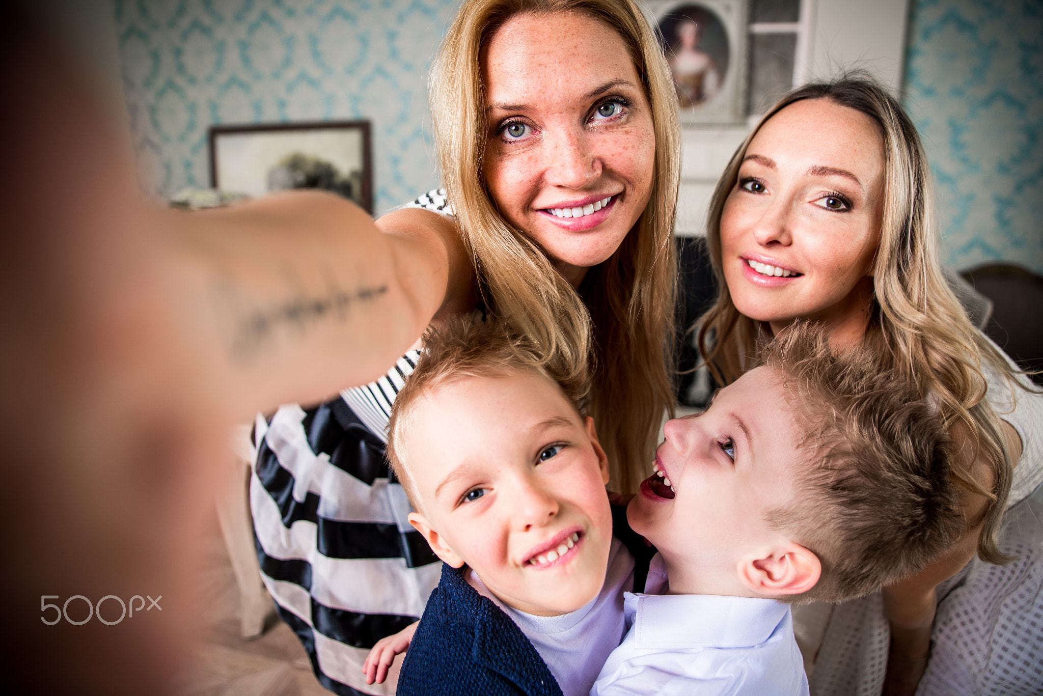 Moms and kids spending time in the living room