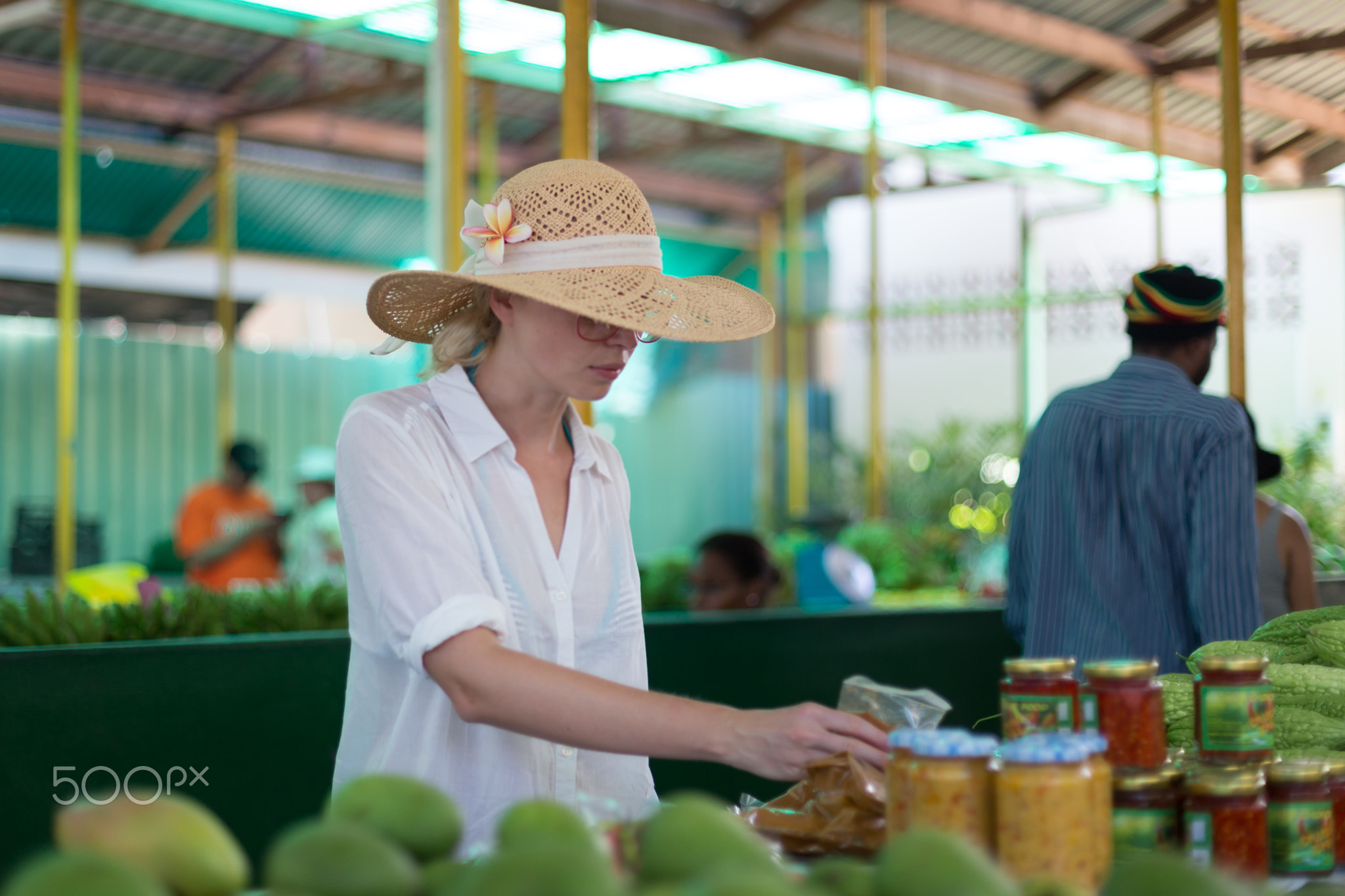 Traveler shopping on traditional Victoria food market, Seychelles.