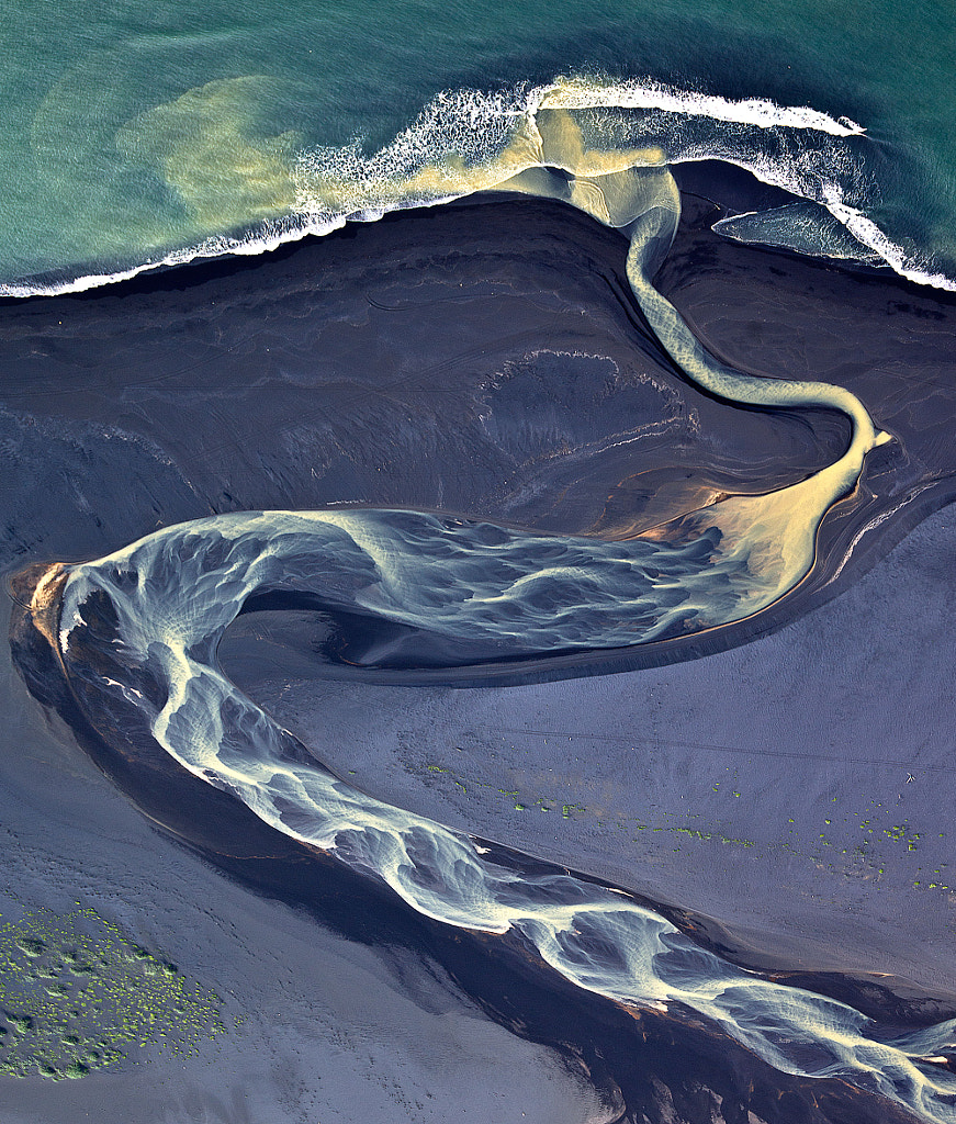 Volcano in Iceland a projection in the river by Andre Ermolaev on 500px.com