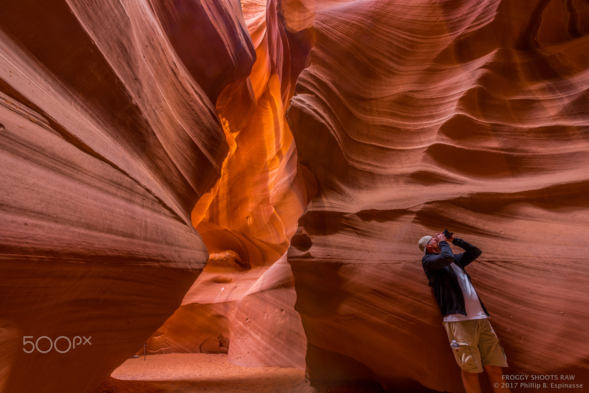 tourist taking photo of upper Antelope canyon