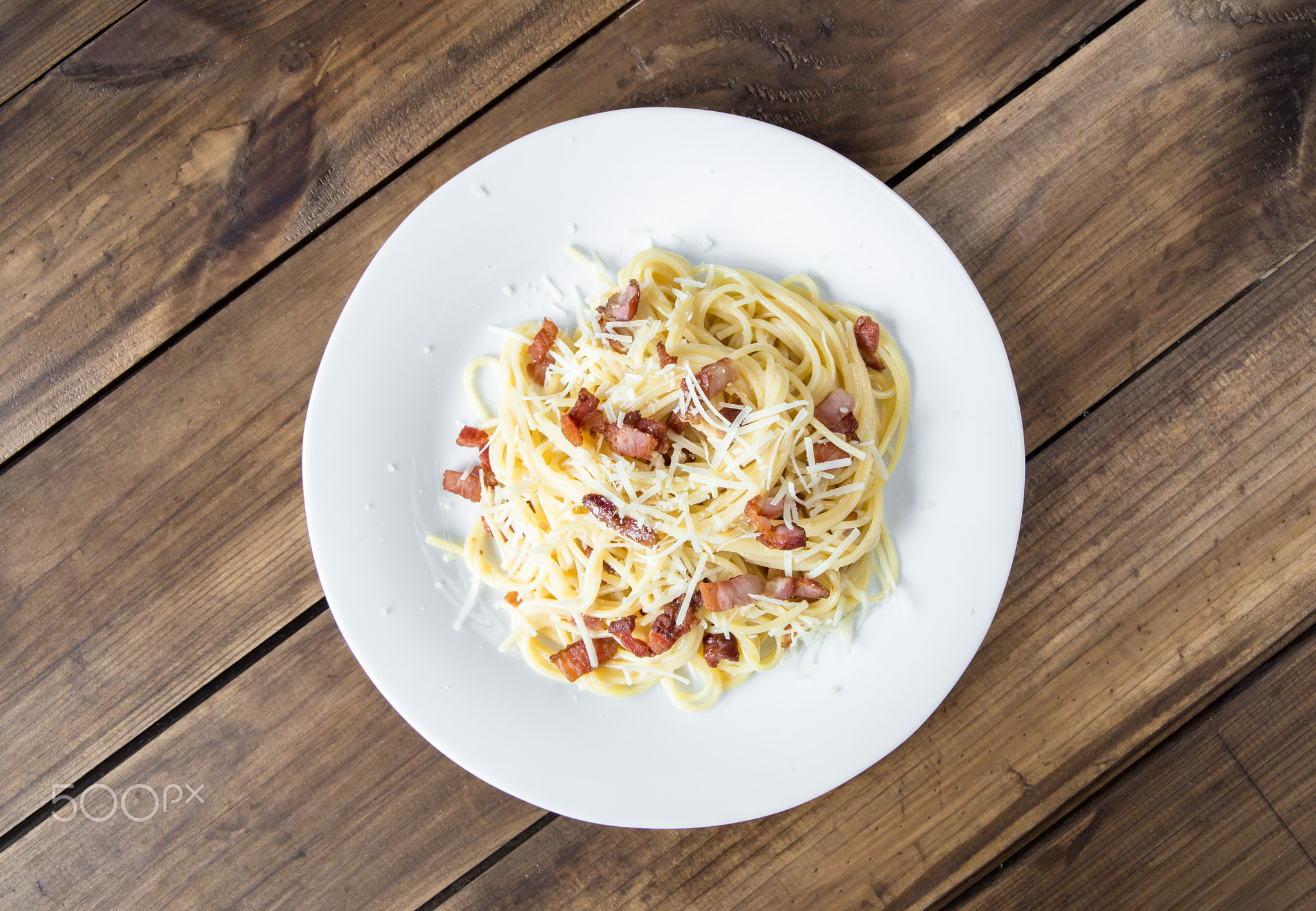 Pasta Carbonara. Spaghetti with bacon and parmesan cheese.