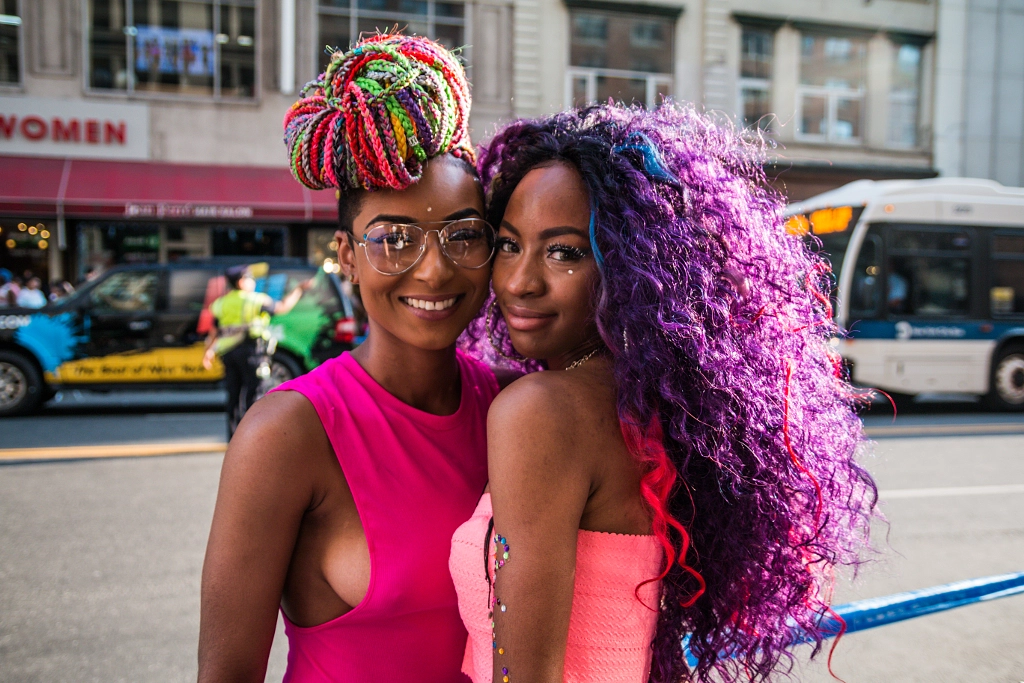 Women couple smiling at NYC Pride Parade by hiiso on 500px.com