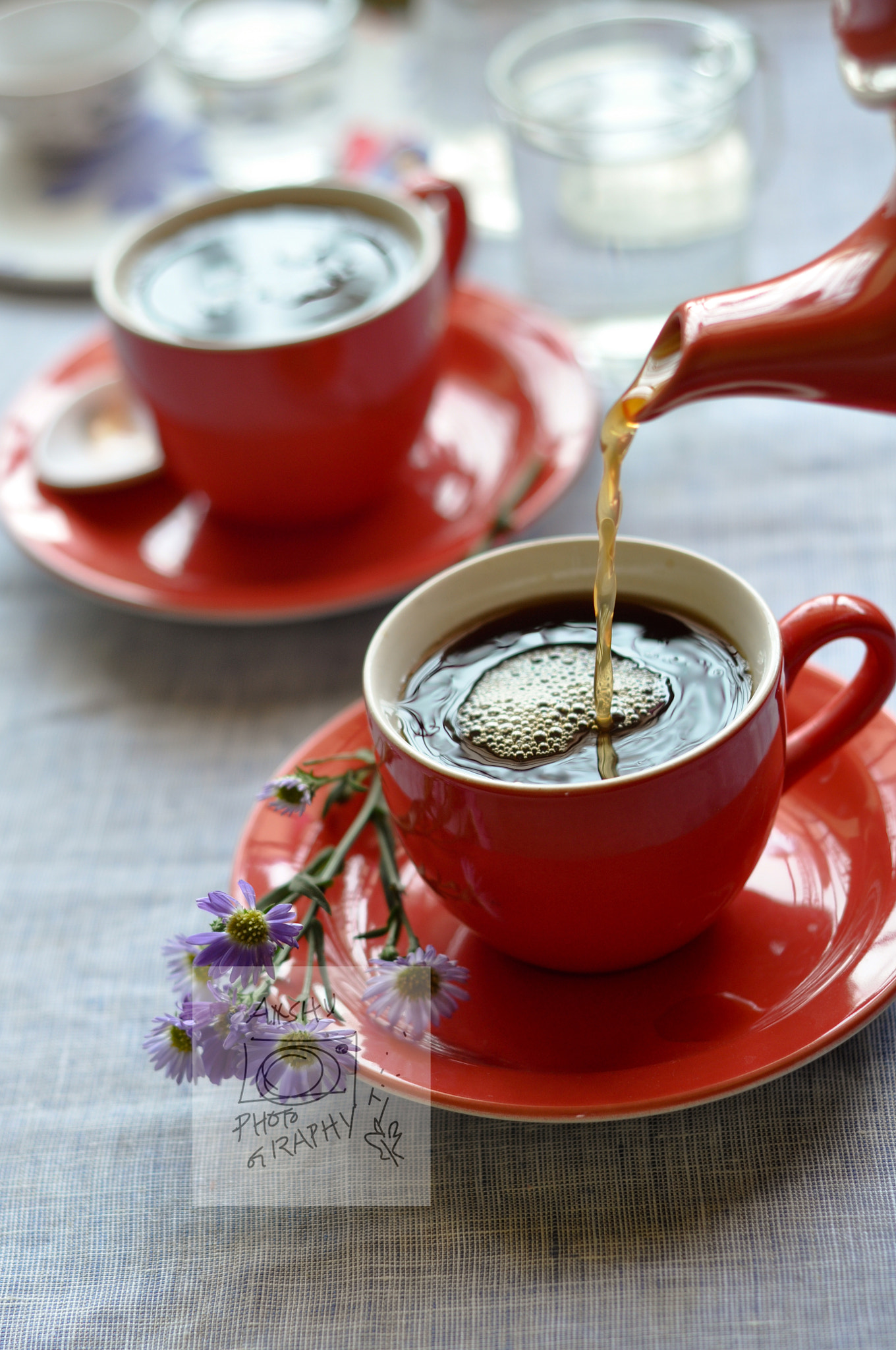 Teaset with tea pouring