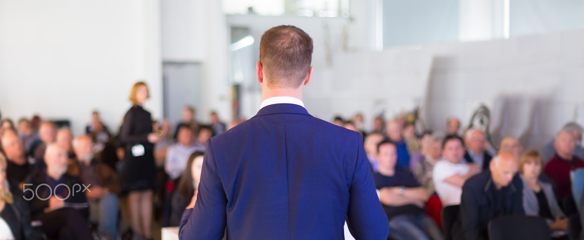 Speaker at Business Conference and Presentation.