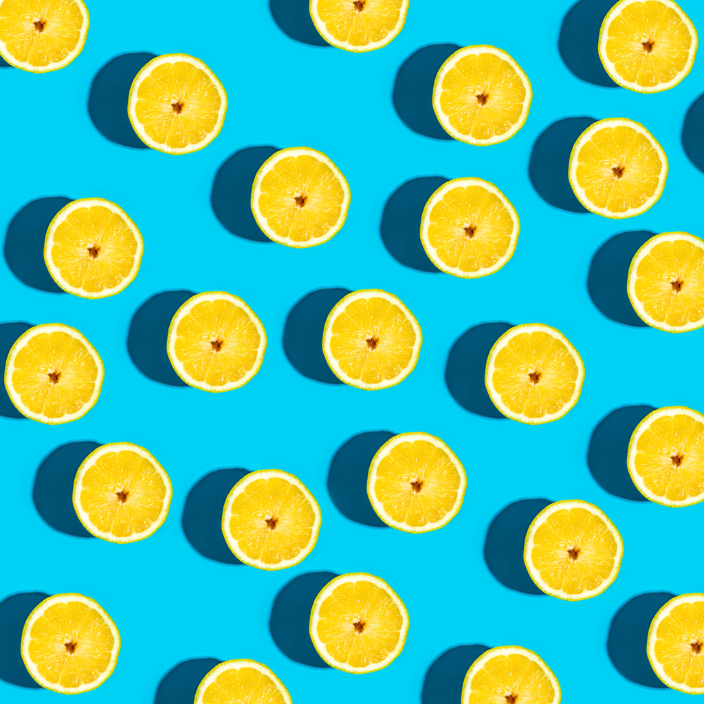 Fresh lemon pattern on a vivid blue background by Michiko Tierney on 500px.com