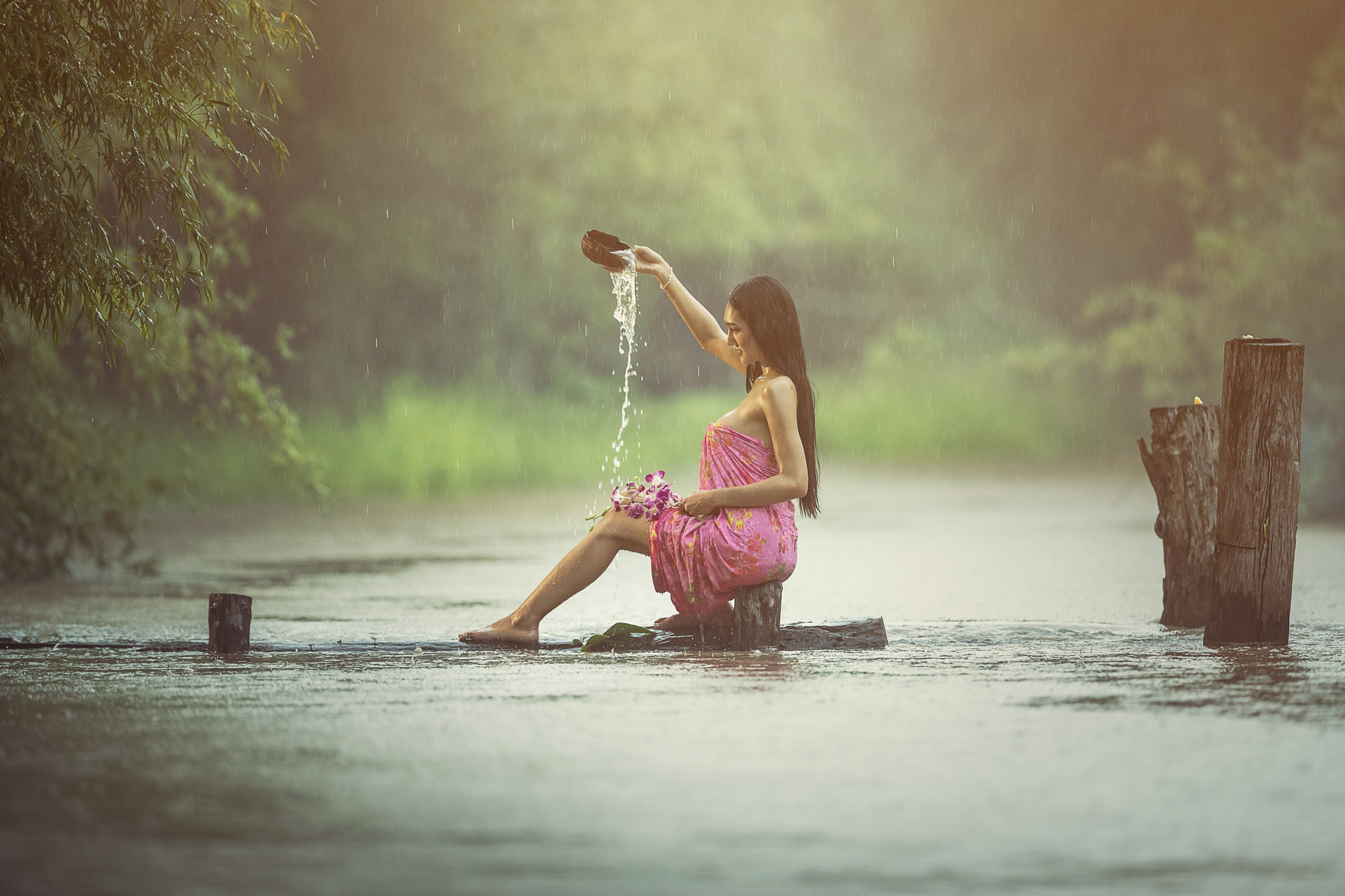 Asian sexy women bathing in the rain