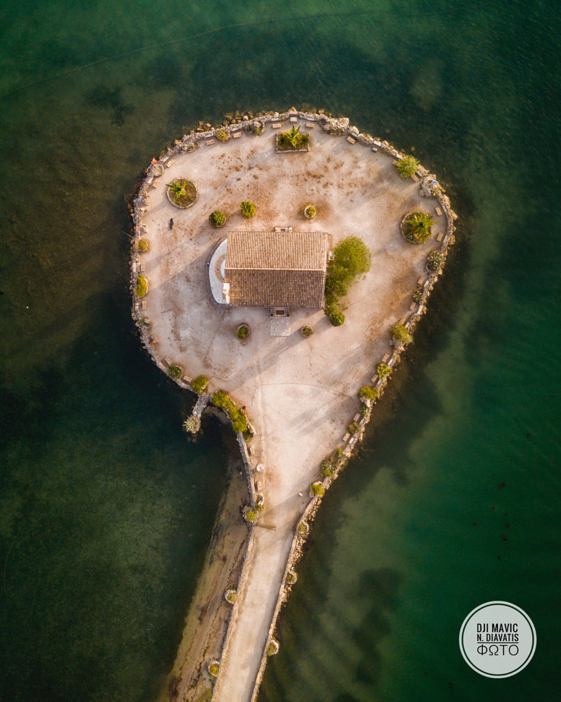 Aerial photo of the small church at the komeno by Nikolaos Diavatis on 500px.com