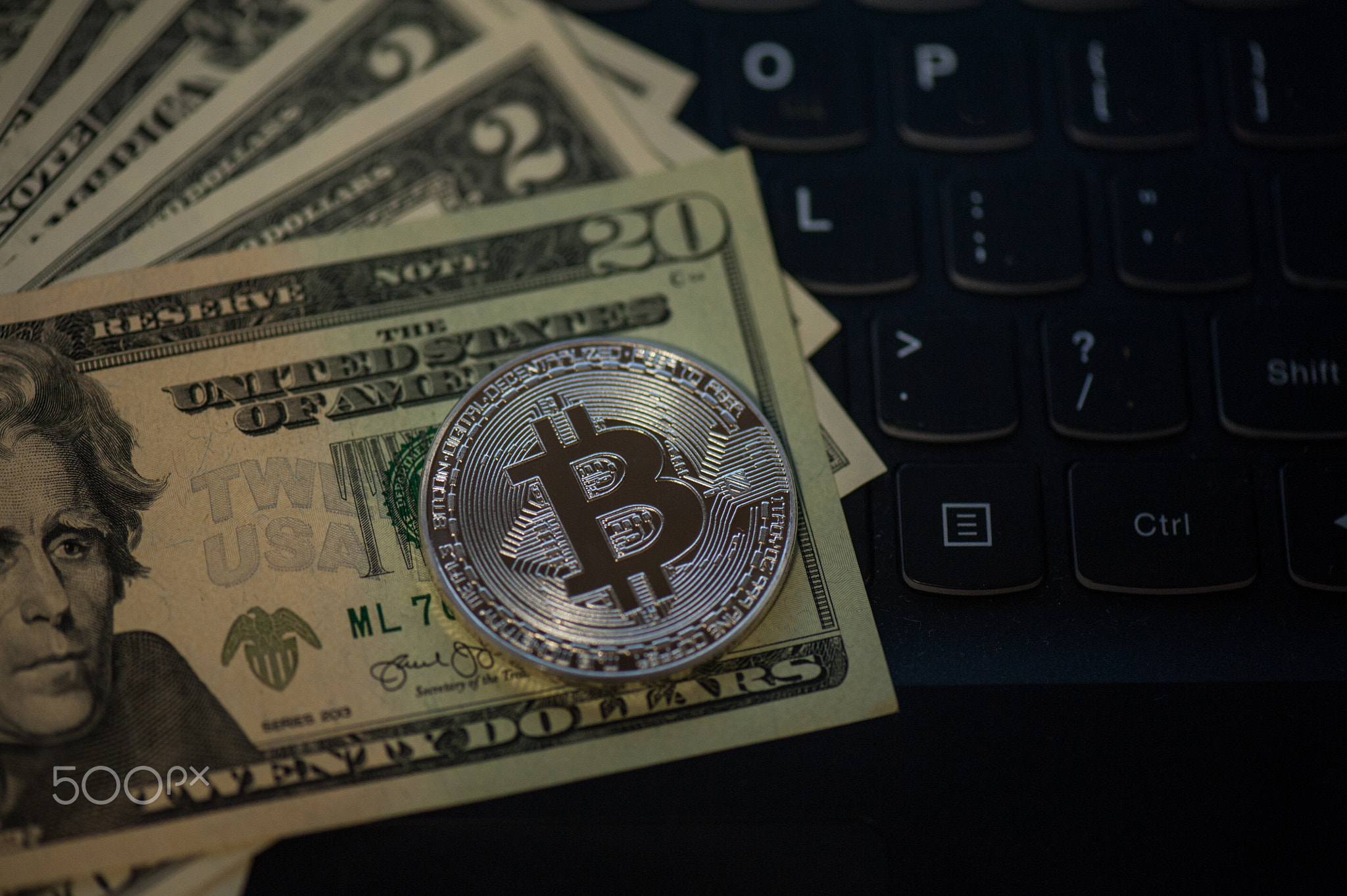 Bitcoin coin with dollars