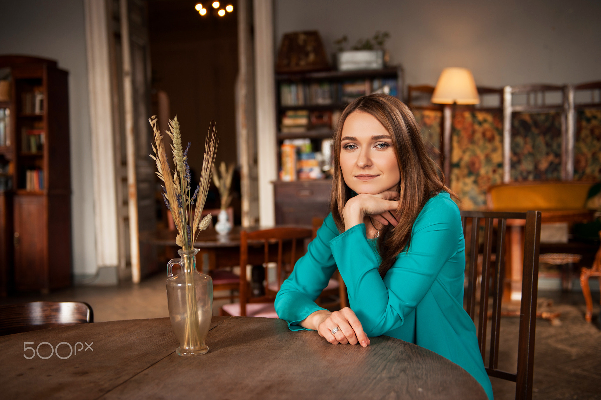 Portrait of beautiful woman in room