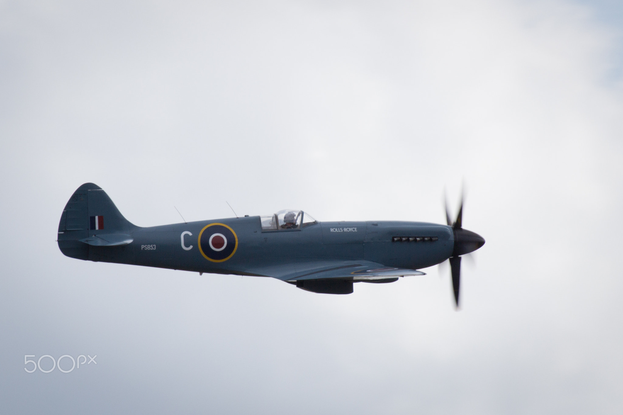 A Supermarine Spitfire performs at Duxford Flying