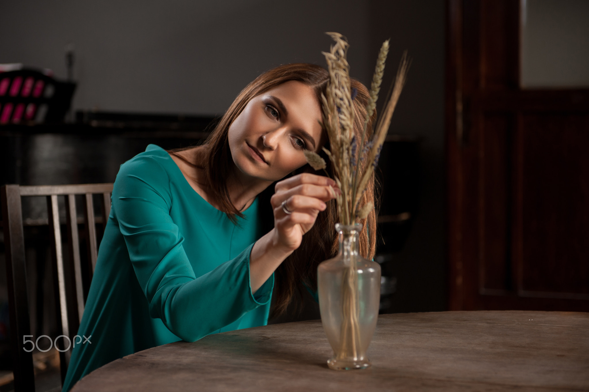 Portrait of beautiful woman in room