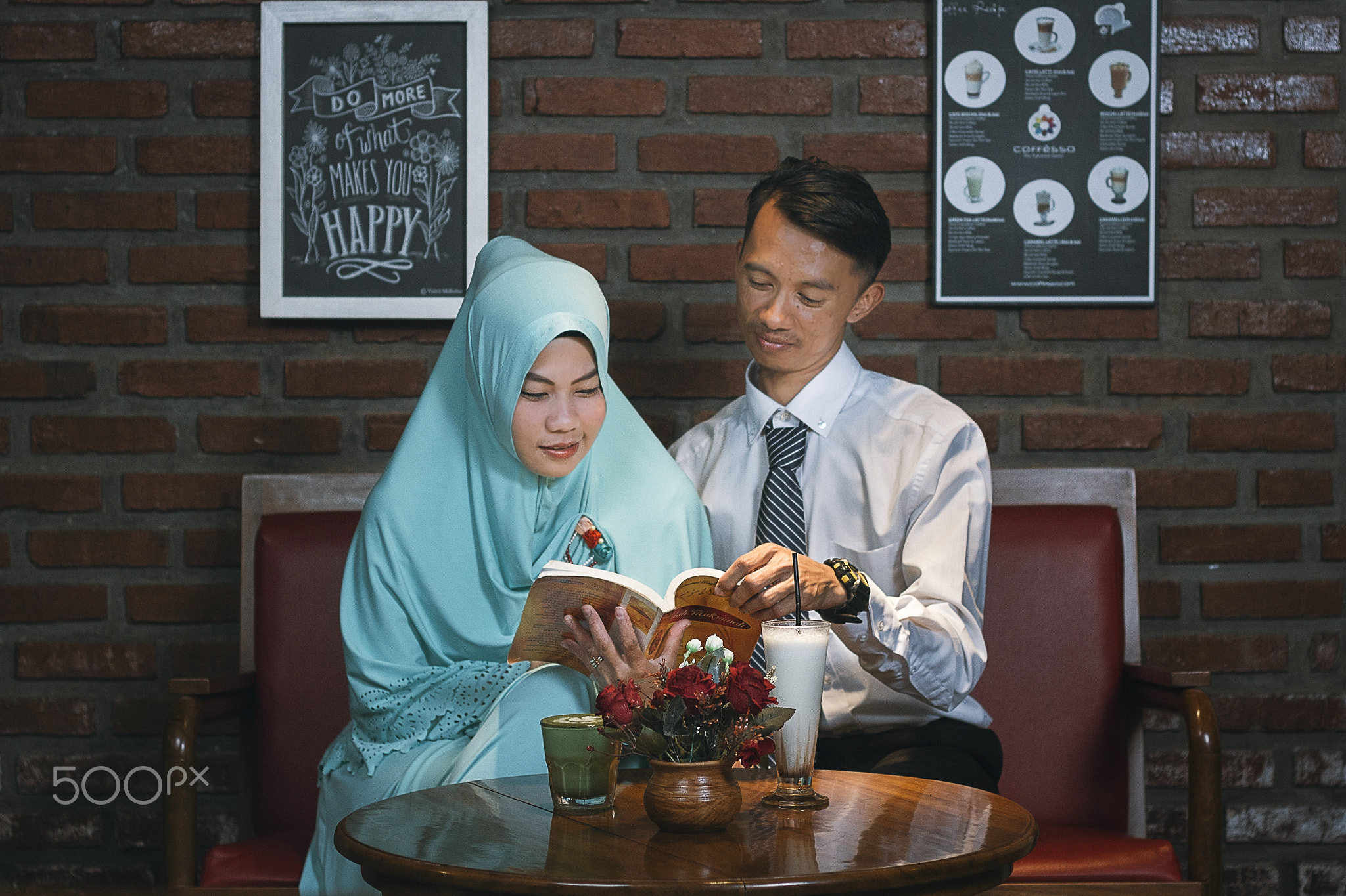 Couple reading a book