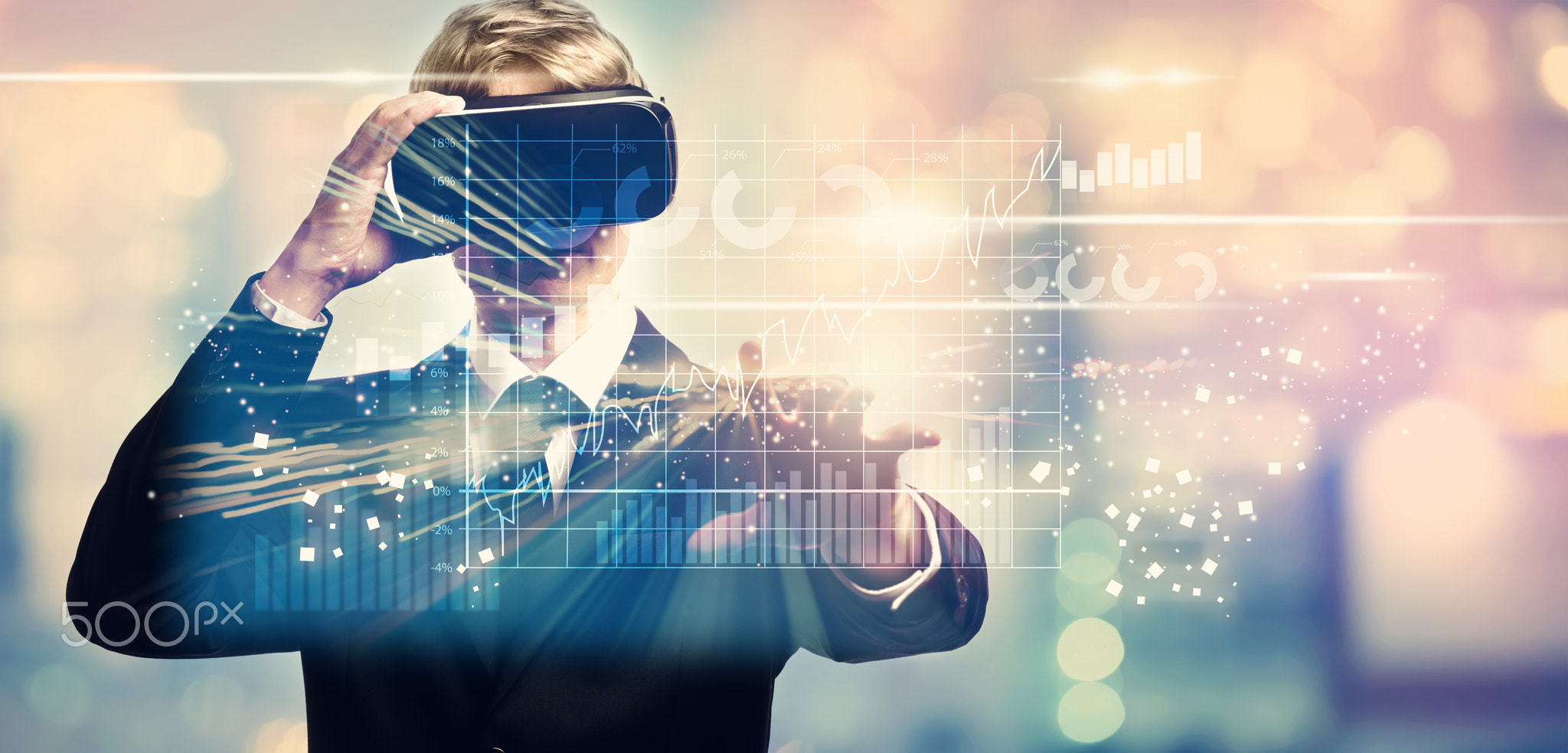 Graphs with businessman using a virtual reality