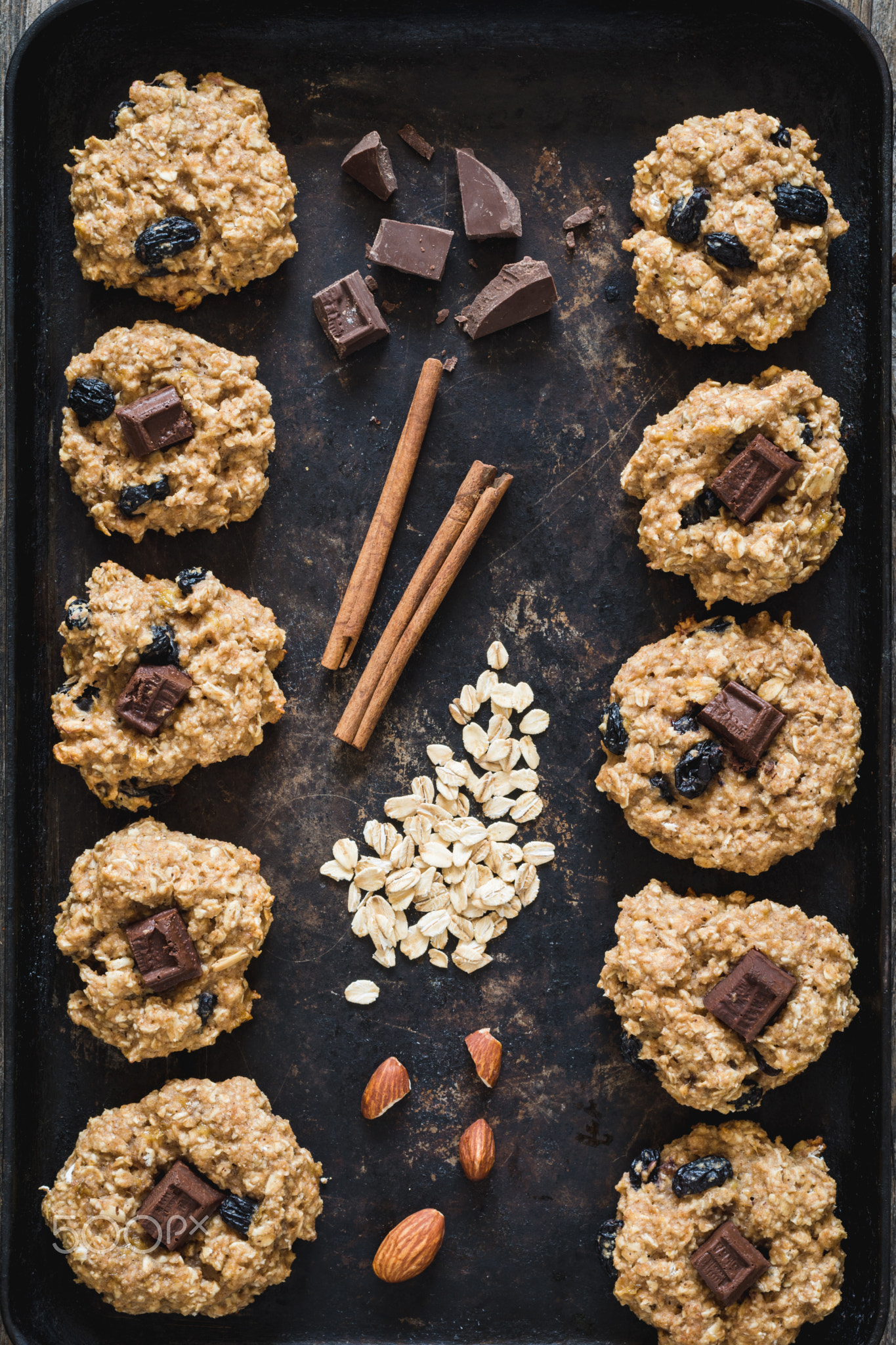 Oatmeal raisin cookies on old cookies sheet