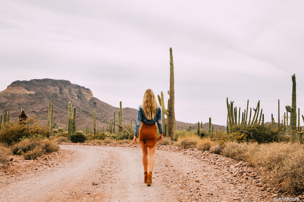 Blonde girl on road in OrganPipeCactusNM KMphoto by KMphoto on 500px.com