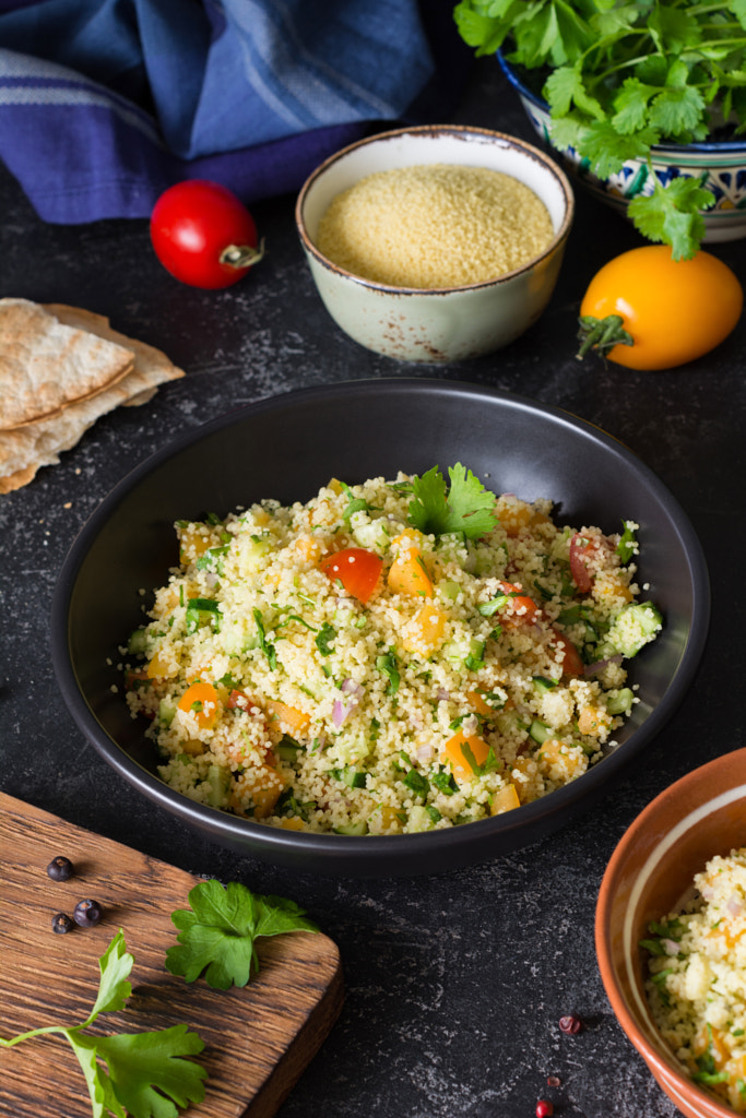 Tabbouleh healthy cous cous salad or side dish in bowl by Vladislav Nosick on 500px.com
