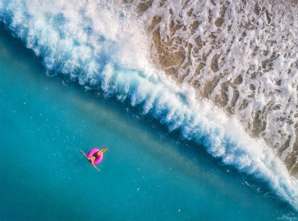 Aerial view of young woman swimming by Denys Bilytskyi on 500px.com