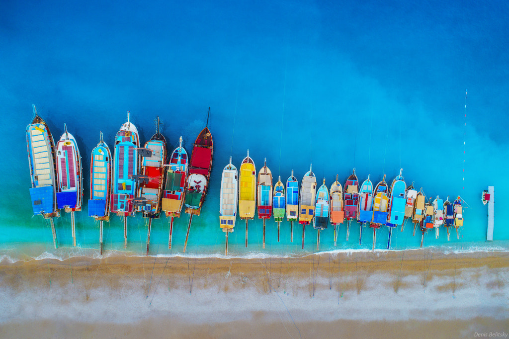 Aerial view of colorful boats in mediterranean sea by Denys Bilytskyi on 500px.com