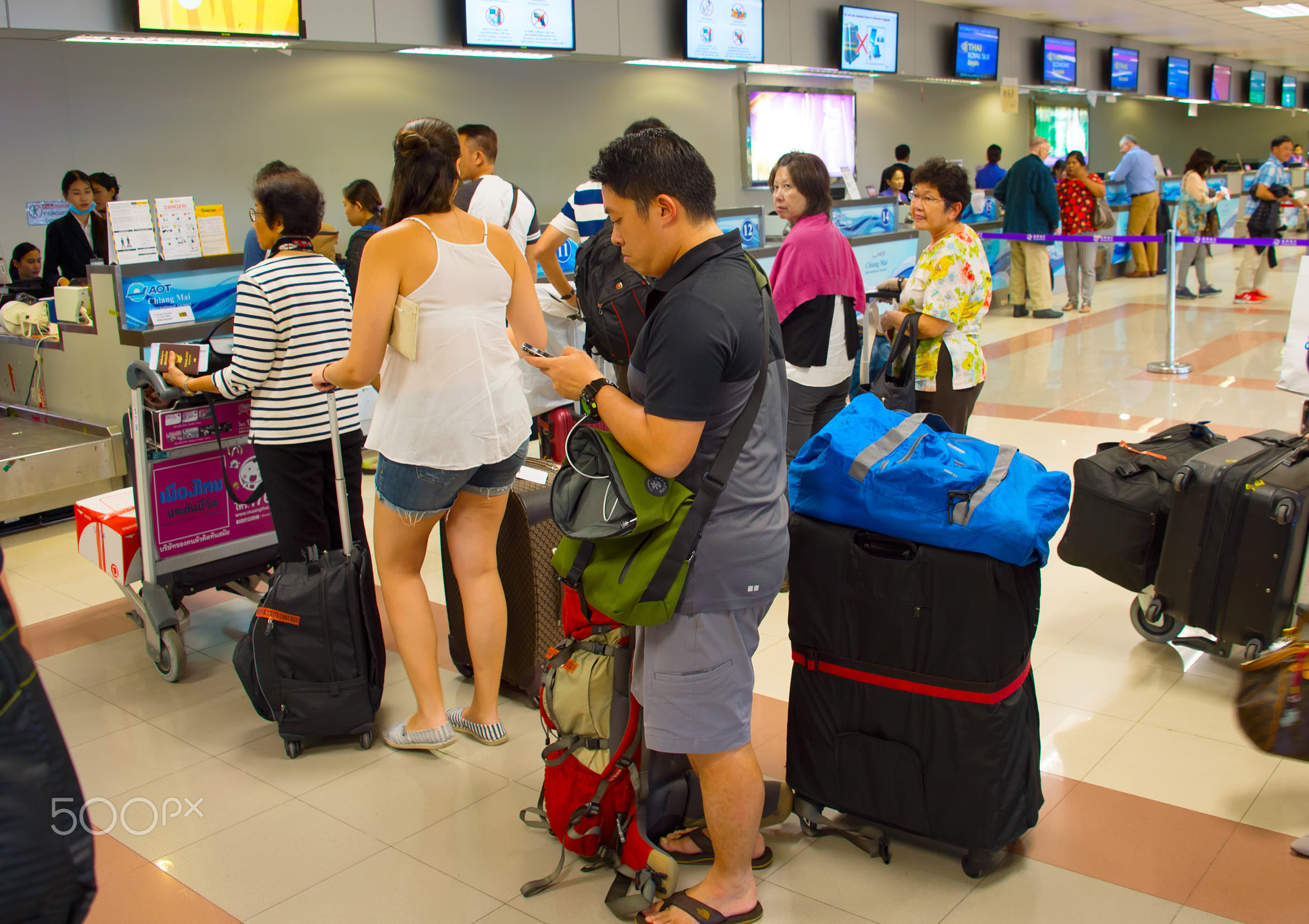 Queue at airport check-in counter