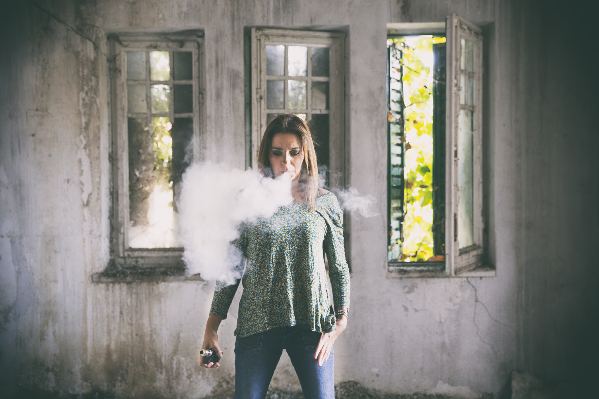 Young woman vaping