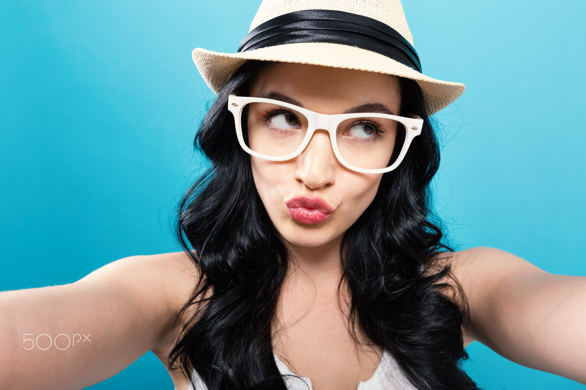 Young woman taking a selfie