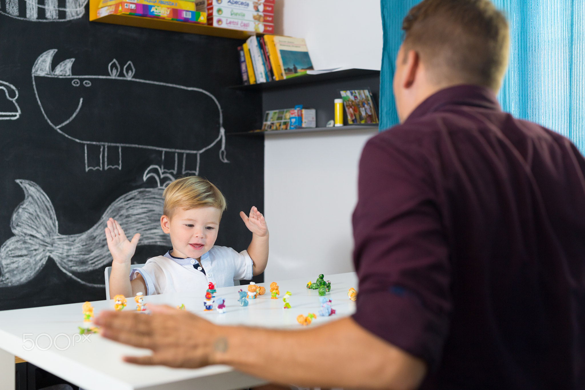 Cute little toddler boy at child therapy session.